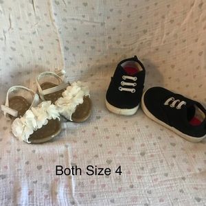 White sandals and black sneakers